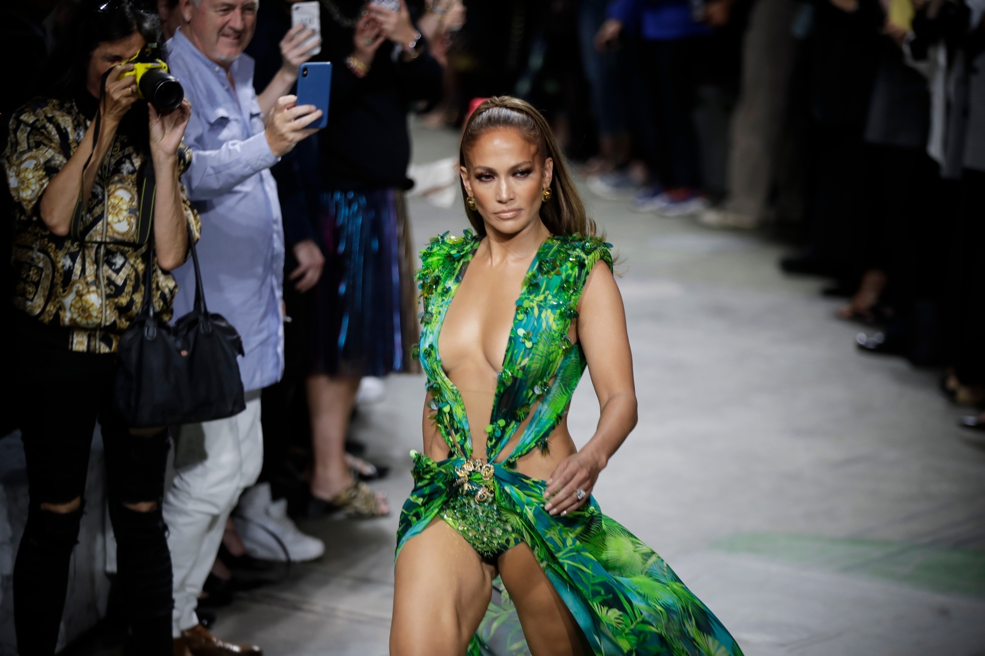 Jennifer Lopez wears a creation as part of the Versace Spring-Summer 2020 collection, unveiled during the fashion week, in Milan, Italy, Friday, Sept. 20, 2019.